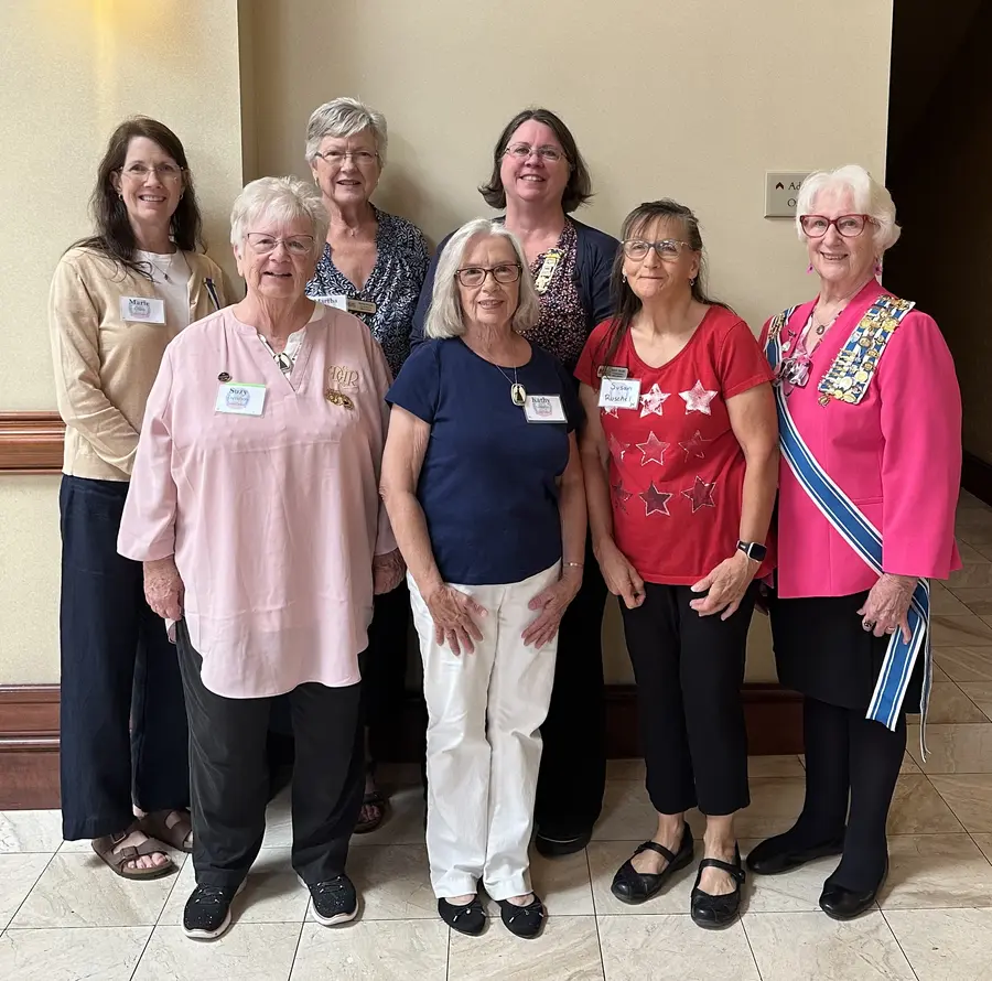 Seven Lucy Knox Chapter members together at the State Committee Showcase